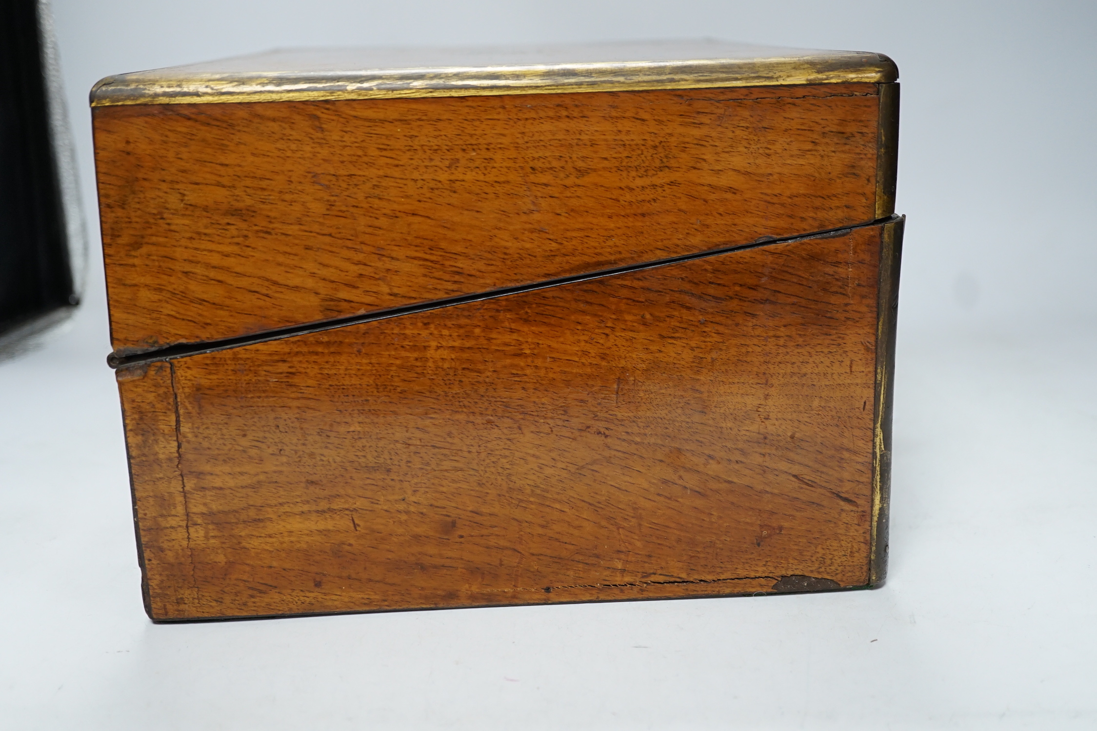 A 19th century brass inlaid burr walnut writing box, 34cm wide